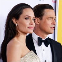 Като Ин и Ян: Анджелина Джоли и Брад Пит на премиерата на "Край морето"